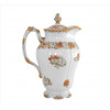 <p>J. POUYAT LIMOGES, Bule de porcelana finamente esmaltada, ornamentado com motivos florais e douração, marca de manufatura sob a base. Alt. 24 x 17 x 12cm. França, início séc. XX</p>