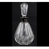 <p>Licoreira de cristal em forma bojuda decorada com caneluras, bocal de prata-de-lei contraste 925 - Argentina. Alt. 22 x 10cm. Séc. XX (com trincado interno)</p>