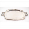 <p>FRACALANZA, Bandeja de metal espessurado à prata, ornamentada com laços e caneluras. 51 x 33 x 03cm.</p>