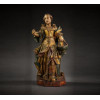 <p>SANTA MARTA, Imagem de madeira finamente entalhada, policromada e dourada, vestes ornamentadas com ramagens e motivos florais. Alt. 55 x 27 x 19cm. Brasil Séc. XVIII</p>