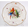 <p>BAVARIA, Prato de porcelana esmaltada, ornamentado com figuras de aves em reserva central, borda fenestrada, marca da manufatura sob a base. Diam. 26cm. Alemanha, séc. XX</p> <p>BAVARIA, Prato de porcelana esmaltada, ornamentado com figuras de aves em reserva central, borda fenestrada, marca da manufatura sob a base. Diam. 26cm. Alemanha, séc. XX</p>