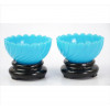 <p>Par de bowls de opalina na tonalidade azul, ornamentados com caneluras, acompanham bases de porcelana esmaltadas na tonalidade preta. (total c/ base). França, início séc. XX</p>