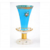<p>Floreira de opalina nas tonalidades branco, azul e dourado, ornamentada com motivos florais. França, séc. XIX (com pequeno bicado e restauro mínimo no bocal)</p> <p>Floreira de opalina nas tonalidades branco, azul e dourado, ornamentada com motivos florais. França, séc. XIX (com pequeno bicado e restauro mínimo no bocal)</p>