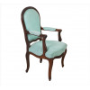<p>Cadeira de braços de madeira entalhada, estilo Luis XV, forração de tecido na tonalidade azul tiffany. Alt. 97 x 54 x 48cm. Séc. XX</p>