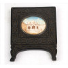 <p>Miniatura pintada sobre placa, representando palácio indiano, moldura de madeira entalhada. 11 x 09 x 01cm. Índia, séc. XX</p>