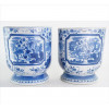 <p>Par de floreiros de parede, porcelana esmaltada nas tonalidades azul e branca, ornamentados com figuras de peixes e motivos florais. Alt. 27 x 23 x 10 cm cada. China, séc. XX</p>