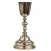 <p>Raro cálice litúrgico em prata. Copo liso, fuste em balaústre e base circular alteada. Sem marcas, Salvador, Bahia, trabalho atribuível ao séc. XVIII (c. 1750/1770). Peso: 490 gramas. Dimensões: 25 x ø13 cm.</p>