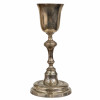 <p>Raro cálice litúrgico em prata. Copo liso, fuste em balaústre e base circular alteada. Sem marcas, Salvador, Bahia, trabalho atribuível ao séc. XVIII/XIX (c. 1790/1810). Peso: 325 gramas. Dimensões: 24 x ø11 cm.</p>