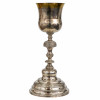 <p>Raro cálice litúrgico em prata. Copo liso, fuste em balaústre e base circular alteada. Sem marcas, Salvador, Bahia, trabalho atribuível ao séc. XVIII/XIX (c. 1790/1810). Peso: 310 gramas. Dimensões: 25 x ø12 cm.</p>