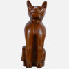 <p>Gato - Escultura de artesanato em madeira nobre. Brasil, séc. XX. Assinado na base. Dimensões: 76 x 25 x 35 cm.</p>