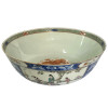 <p>Raro bowl em porcelana azul e branca com reservas a decoração Família Rosa. Parte interna decorada com dragão com cinco garras indicando Família Imperial. China, Qing, século XVIII. Pequenos desgastes da época. 9 x 22 cm.</p>