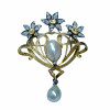 <p>Broche em ouro, diamante, p&eacute;rola, ouro e prata. 17 gramas.</p>