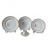 <p>Servi&ccedil;o remanescente em porcelana francesa decorada a ouro com monogram composto por: 12 pratos de sobremesa; 6 x&iacute;caras com pires; 6 pratos fundos; 15 pratos rasos; 12 pratos de sobremesa. Fran&ccedil;a, s&eacute;culo XIX.</p>