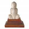 <p>Escultura em marfim representando Buda. China, cerca de 1900. 9 x 6 x 3 cm.</p>