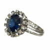 <p>Anel com pedra azul e diamante. 5,6 gramas.</p>