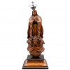 <p>Escultura em madeira representando Nossa Senhora. Peanha composta por três cabeças de anjos e meia lua invertida e serpente. Portugal, século XVII. 23 cm (sem base) e 26 cm (com base).</p>