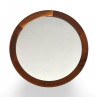 <p>Espelho circular executado em jacarandá maciço, datado da década de 1960. Apresenta pequena oxidação no espelho. Dimensões: Diâmetro 50 cm</p>