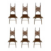 <p>ALBERTO MARCONETTI – Elegante conjunto de seis cadeiras desenhadas por Alberto Marconetti na década de 1960, exemplo notável do design italiano moderno com influência clássica. As peças apresentam estrutura em ferro pintado e madeira, com assentos e encostos em couro natural entrelaçado, presos por rebites metálicos. Os detalhes em ferro — como argolas e ganchos laterais — evocam o universo equestre da Roma Antiga, conferindo caráter escultórico e distintivo às cadeiras. Dimensões: Altura 110 cm × Largura 45 cm × Profundidade 37 cm. (No estado)</p>