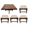 <p>LICEU DE ARTES E OFÍCIOS - Conjunto composto por uma mesa de centro quadrada c. 1950–1960., com tampo folheado em jacarandá e base de quatro pés inteiramente em jacarandá maciço, e quatro banquetas em jacarandá maciço com assentos estofados em courvin. Dimensões aproximadas: Mesa: Altura 45 cm × Largura 60 cm × Profundidade 60 cm. Banquetas: Altura 37 cm × Largura 41 cm × Profundidade 41 cm</p>