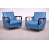 <p>Par de poltronas, design anos 50 estofadas em courvin azul e madeira nobre. 78cm x 71cm x 63cm. P.S.: Caso tenha interesse em ver a pe&ccedil;a pessoalmente, entre em contato conosco.</p>