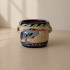 <p>AMPHORA - Cachepot em cerâmica. Manufatura tchecoslovaca, com marca na base Made in Czecho-Slovakia. Produzido pela tradicional fábrica Amphora, reconhecida por suas peças de inspiração Art Nouveau e Art Déco. 23 cm de alt.; 28 cm de diâm.</p>