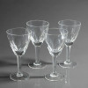 BOHEMIA - Czech Republic - Lote com (4) Taças para Vinho Branco, Lapidadas e Pés Chanfrados - Altura: 14 cm<br /><br />Lote com 4 taças para vinho branco em cristal lapidado da Bohemia - Czech Republic / Tchecoslováquia - cristais da Boêmia.<br /><br />Modelo clássico com bojo facetado em gomos / olivais na parte inferior, haste facetada hexagonal chanfrada e pé em disco.<br /><br />Cristal pesado e transparente de alta qualidade, lapidação artesanal precisa com brilho intenso característico da Boêmia, haste com facetas em 6 lados / chanfrada.<br /><br />Altura: 14 cm aprox.