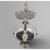 <p>WMF GERMANY (W&uuml;rttembergische Metallwaren Fabrik) CENTRO DE MESA DE GRANDE PORTE, marcado na base. PER&Iacute;ODO NEOCL&Aacute;SSICO, S&Eacute;CULO XIX. Encimado por figura da VIT&Oacute;RIA segurando duas l&aacute;ureas. Em dois est&aacute;gios: prato principal sustentado por dois bra&ccedil;os curvos. Orlas figurando frutos, s&iacute;mbolo da fartura. Elementos decorativos em galeria vazada. Prato superior em cristal lapidado, pequenos desgastes.BANHO DE PRATA REFEITO. MEDIDAS: 79 X 42 X 35 CM</p>