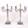 <p>Par de candelabros em prata portuguesa, com contraste L. Coroa. Portugal, séc. XIX. Dimensões: 61 cm alt.</p>