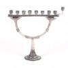<p>Menorá de Chanucá em prata de lei (Sterling 925). Dimensões: 19 cm de altura, 18 x 6 cm.</p>