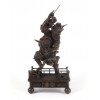 <p>Escultura de bronze representando BISHAMONTEN subjugando um ONI , período Meiji de autoria de OSHIMA JOUN . Japão Sec XIX - 49 cm alt.Joun nasceu em uma família de metalúrgicos e era famoso por sua habilidade em fundir bronze. Ele era filho de Ōshima Takajiro, cujo próprio pai, Ōshima Yasubei, foi o primeiro artesão de metal da família. Ele foi professor na Escola de Belas Artes de Tóquio (東京美術学校 Tōkyō Bijutsu Gakkō; nome alterado em 2008 para Universidade de Artes de Tóquio) de 1887 até 1932.</p>