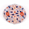 <p>Covilhete de porcelana esmaltada decoração padrão Imari. Japão séc XIX - 22 x 19 cm.</p>