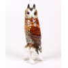 <p>Escultura em porcelana esmaltada representando “Coruja” 27cm alt x 11cm larg.</p>