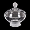 <p>Lalique. Caixa de formato circular em cristal transparente com detalhes despolidos. Marcas da maison na base. França, 1950. 13 cm alt. 12 cm diâm.</p>