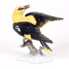 <p>Rosenthal, bela escultura em porcelana esmaltada alemã, manufatura Rosenthal representando um “Pássaro macho de oriole-dourado”, modelo 1755. 20 cm alt x 18 cm larg.</p>