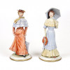<p>CAPODIMONTE - Porcelana com rica policromia em esmalte, decorada com figuras em alto-relevo. 26 cm de alt. A retirada deste lote, bem como o transporte, &eacute; de inteira responsabilidade do comprador. (Com ligeiros bicados)</p>