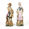 <p>Par de esculturas em biscuit policromado, representando casal de músicos. Europa, séc. XIX. (Necessita de restauro)</p> <p>Par de esculturas em biscuit policromado, representando casal de músicos. Europa, séc. XIX. (Necessita de restauro)</p>