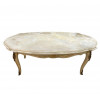 <p>Mesa de centro em madeira, com tampo de m&aacute;rmore e aplica&ccedil;&otilde;es em lat&atilde;o. 48 cm de alt.; 123 x 66 cm.</p>