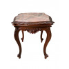 <p>Mesa auxiliar em madeira entalhada, com tampo de mármore. 55 x 50 x 50 cm.</p> <p>Mesa auxiliar em madeira entalhada, com tampo de mármore. 55 x 50 x 50 cm.</p>