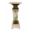 <p>Bela coluna em mármore e porcelana, com rico trabalho em esmalte representando paisagem e aplicações em dourado. Europa, séc. XIX. 103 x 37 x 37 cm.</p> <p>Bela coluna em mármore e porcelana, com rico trabalho em esmalte representando paisagem e aplicações em dourado. Europa, séc. XIX. 103 x 37 x 37 cm.</p>