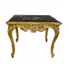 <p>Mesa de apresenta&ccedil;&atilde;o em madeira entalhada e dourada, com tampo em &ocirc;nix finamente marchetado em Pietra Dura fiorentina. Fran&ccedil;a e It&aacute;lia, s&eacute;c. XIX. 75 cm de alt.; 95 x 65 cm. (Tampo no estado)</p>