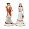 <p>CAPODIMONTE - Delicada porcelana com rica policromia em esmalte, decorada com figuras em alto-relevo. 9 cm de alt.; 13 x 11 cm. It&aacute;lia, s&eacute;c. XX. (No estado)</p>