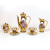 <p>Antigo jogo de ch&aacute; em porcelana dourada, com belo trabalho na parte central em esmalte, representando cena galante, contendo um bule, uma leiteira, um a&ccedil;ucareiro e seis x&iacute;caras com pires. Pe&ccedil;a maior medindo 24 cm de alt.</p>