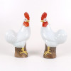<p>Par de escultura de porcelana representando Galo executados a maneira da CIA das Índias . China Séc. XX . 31 cm alt x 16 cm larg.</p> <p>Par de escultura de porcelana representando Galo executados a maneira da CIA das Índias . China Séc. XX . 31 cm alt x 16 cm larg.</p>