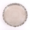 <p>Salva de prata de lei teor 833 com rico trabalho em alto relevo de pés de uva - 39 cm diâm. Brasil Sec XX</p> <p>Salva de prata de lei teor 833 com rico trabalho em alto relevo de pés de uva - 39 cm diâm. Brasil Sec XX</p>