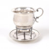 <p>Aquecedor de conhaque em prata não contrastada. medida total 12 cm alt, 13 cm diâm.</p> <p>Aquecedor de conhaque em prata não contrastada. medida total 12 cm alt, 13 cm diâm.</p>