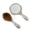 <p>Conjunto de tocador composto por espelho e escova estilo e época Art Noveaux marcado J.S.C - Quadrupleplate.</p> <p>Conjunto de tocador composto por espelho e escova estilo e época Art Noveaux marcado J.S.C - Quadrupleplate.</p>