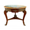 <p>Mesa auxiliar com tampo de marmore e detalhes em bronze - 72 cm alt, 86 cm diâm.</p> <p>Mesa auxiliar com tampo de marmore e detalhes em bronze - 72 cm alt, 86 cm diâm.</p>