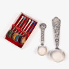 <p>Lote com 6 colheres para café em esmalte e prata e 2 colheres comemorativas - Norueguesas</p>
