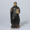 <p>Santo Inácio de Loyola - Brasil, século XVII. Imagem Paulista de madeira policromada, representando o Santo, fundador da Companhia de Jesus, de pé, segurando livro com a mão esquerda, sobre base retangular de cantos chanfrados; 18 cm de altura total. Está ausente na Imagem, o braço direito. Origem: espólio de Cárbia Sabatel Bourroul e José Celestino Monteiro de Barros Bourroul.</p>