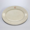 <p>Colégio São Luiz de Ytu. - Inglaterra século XIX-XX. Travessa de Louça inglesa, aba plana contendo jarreteira circular com a sigla C.S.L. e no centro Ytu, no reverso a marca de Thomas Hugues & Sons England (1895 -1910); 39 cm de comprimento por 28,5 cm de largura. Apresenta longo fio de cabelo. Origem: espólio de Cárbia Sabatel Bourroul e José Celestino Monteiro de Barros Bourroul.</p>